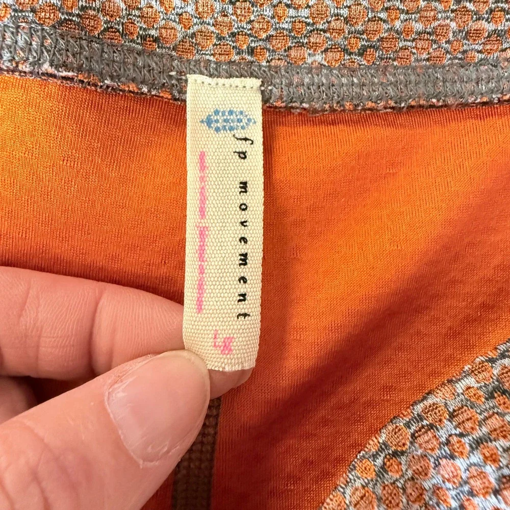 FP Movement Free People Orange‎ Honeycomb Ruffle Kick Flare Leggings Large